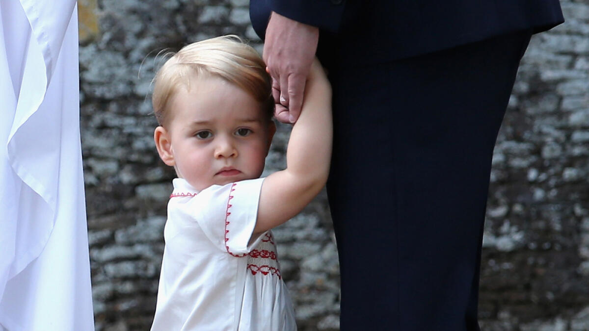 In this file photo, Britains Prince George arrives at the Church of St Mary Magdalene on the Sandringham Estate, England. 