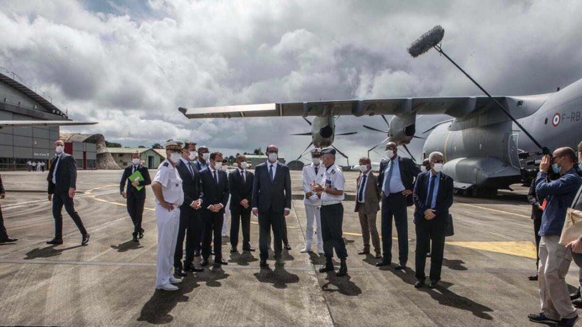 France's Prime Minister Jean Castex, centre, arrives at the Matoury Air Base 367, near Cayenne, French Guiana, Sunday, July 12, 2020. As virus numbers soar in French Guiana, France's new prime minister traveled on Sunday to the South American territory and promised not to ignore its suffering. Photo: AP