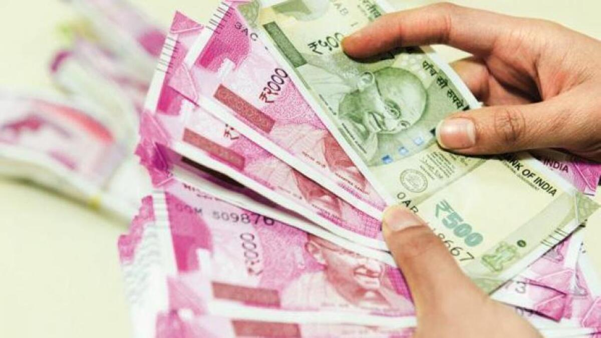 Rupee falls 12 paise, hits fresh 16-month low against dollar