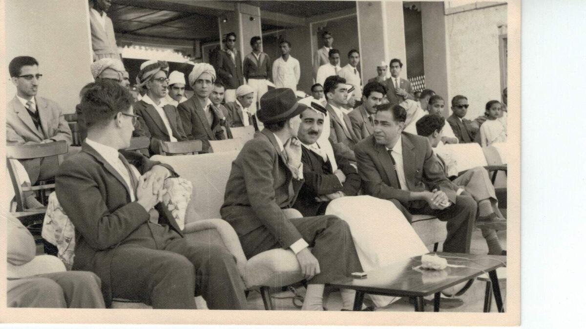 Young Maghanmal Pancholia in conversation with British Political Agent Sir James Craig and Shaikh Khalid Al Qasimi at a function of the Indian Association Dubai in 1962.