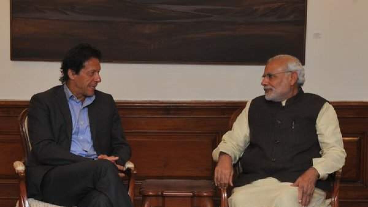 Imran Khan invites Modi to visit Pakistan in New Delhi meet