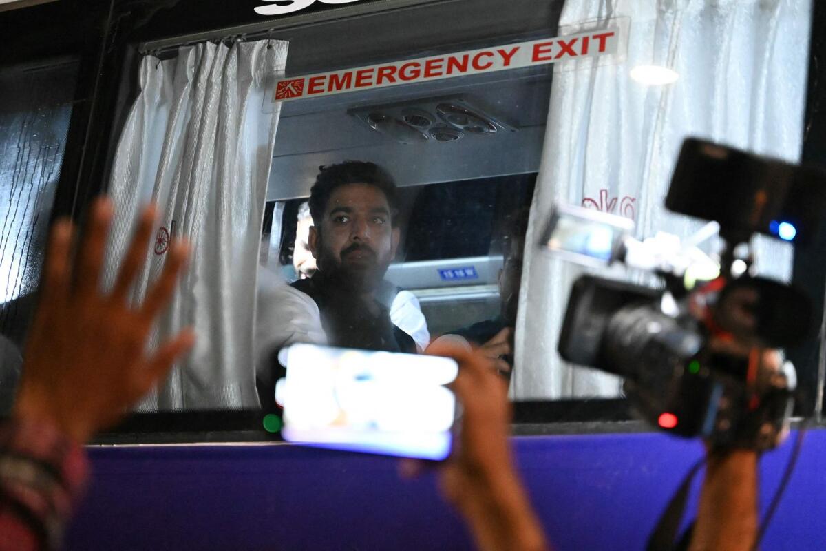 Pakistan’s Haris Rauf looks out from the team bus. — AFP