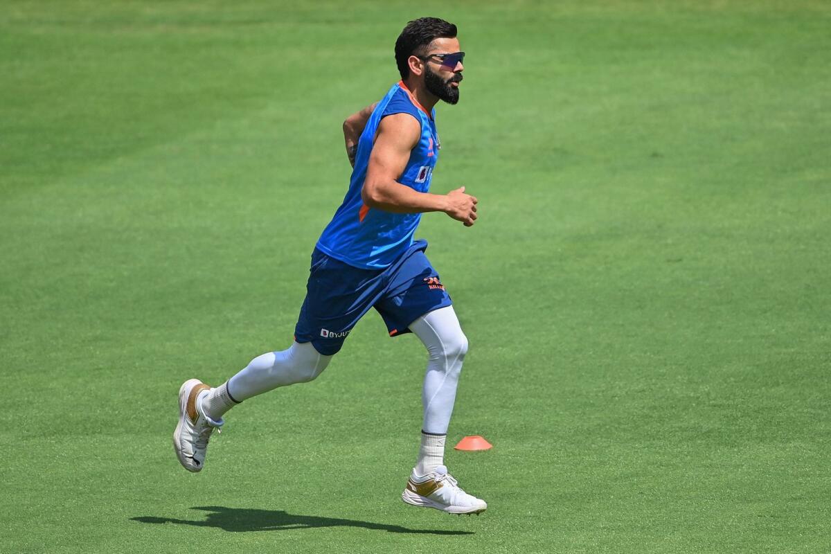 India’s Virat Kohli warms up during a training session at the Narendra Modi stadium in Ahmedabad on Tuesday. — AFP