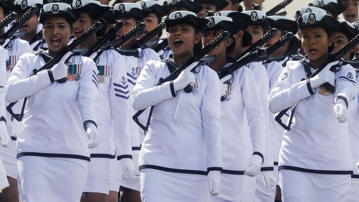 Sri Lanka's female police members march during the country's 75th Independence Day celebrations in Colombo, Sri Lanka, on Saturday. — Reuters