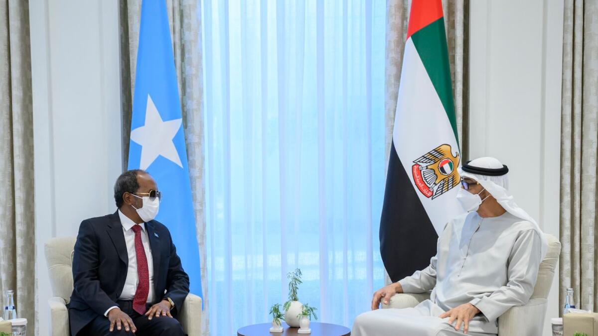 ABU DHABI, UNITED ARAB EMIRATES - June 22, 2022: HH Sheikh Mohamed bin Zayed Al Nahyan, President of the United Arab Emirates (R) meets with HE Hassan Sheikh Mohamud, President of Somalia (L), at Al Shati Palace.( Hamad Al Kaabi / Ministry of Presidential Affairs )​---