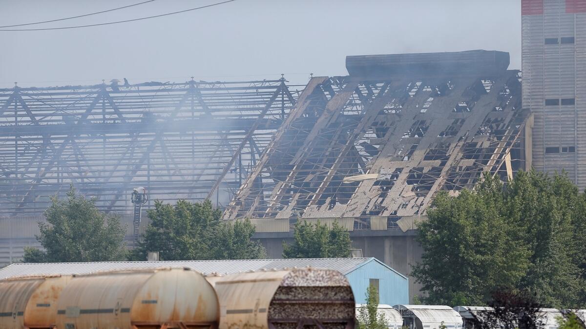 Smoke rises after an explosion at a grain silo that injured several people on the site of the company Silostra, located on the Rhine River port, in Strasbourg, France.- Reuters