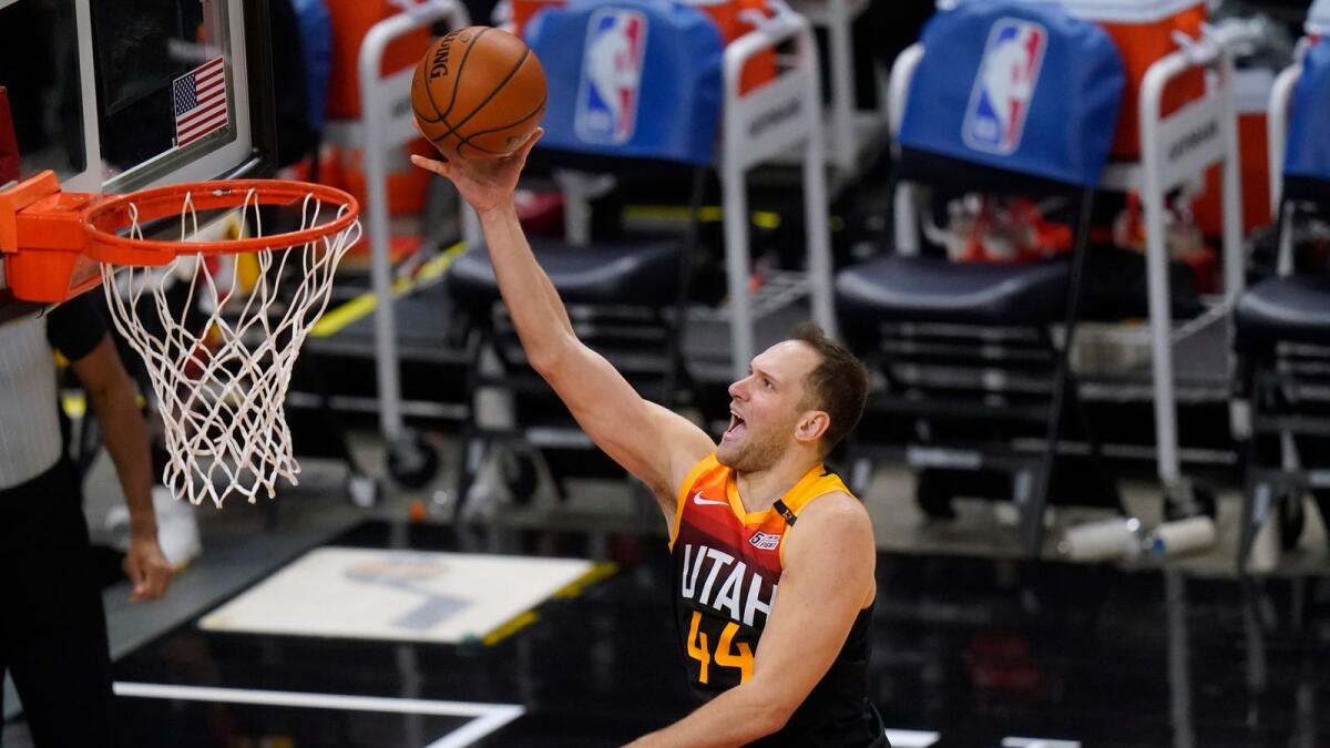 Utah Jazz forward Bojan Bogdanovic (44) lays the ball up in the second half during an NBA basketball game against the Dallas Mavericks.— AP