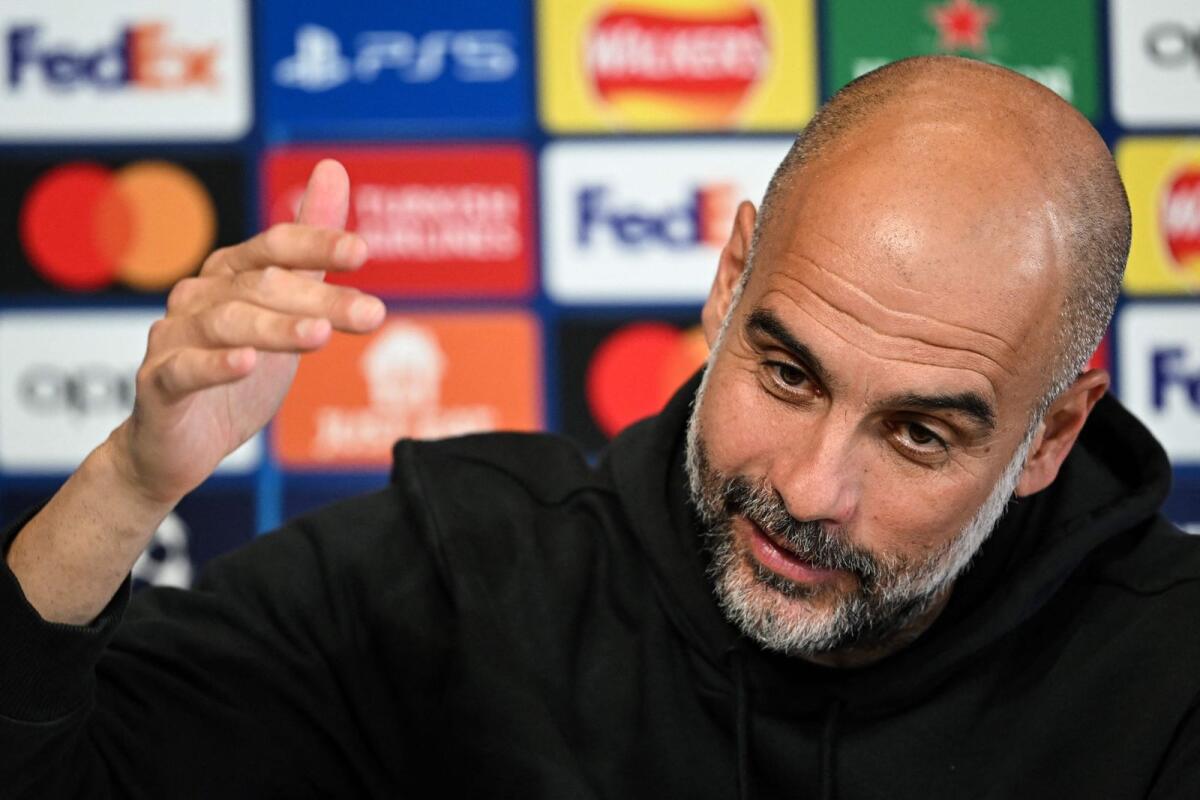 Manchester City manager Pep Guardiola speaks during a press conference at Manchester City training ground on Tuesday. — AFP
