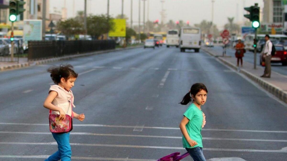 Heading towards the school bus in Sharjah.- Photo by M.Sajjad/ Khaleej Times