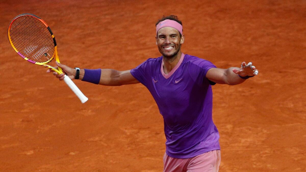 Spain's Rafael Nadal celebrates after winning his final against Serbia's Novak Djokovic. — Reuters