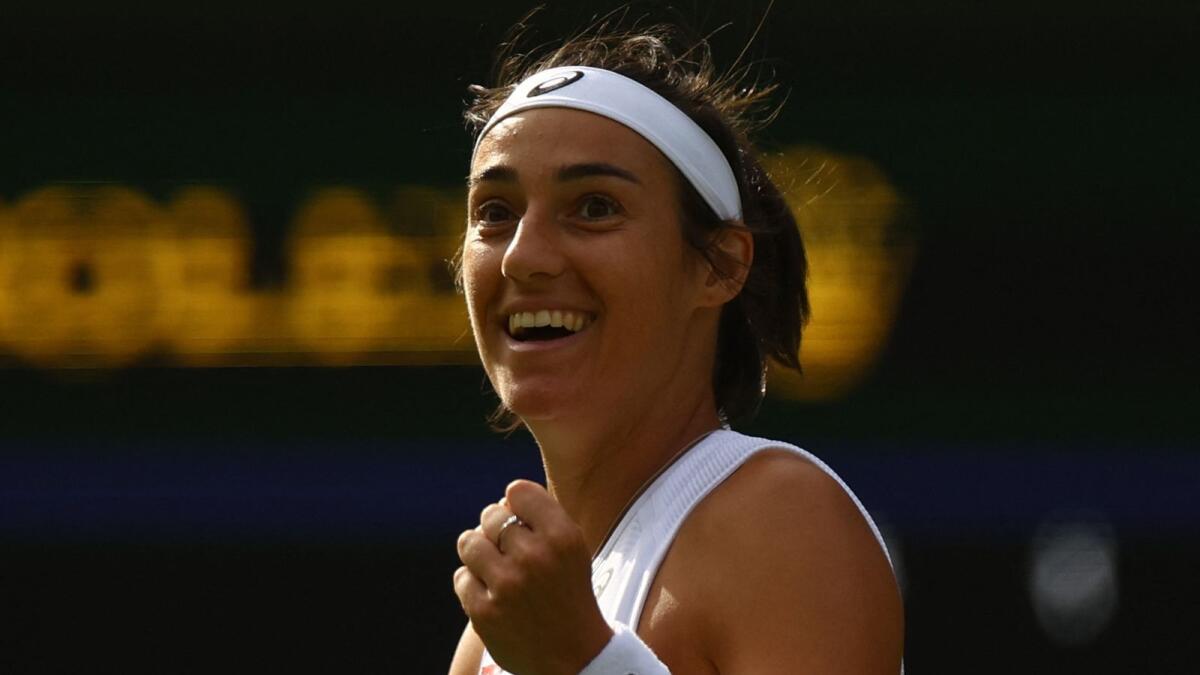 Caroline Garcia celebrates winning her second round match against Emma Raducanu. (Reuters)