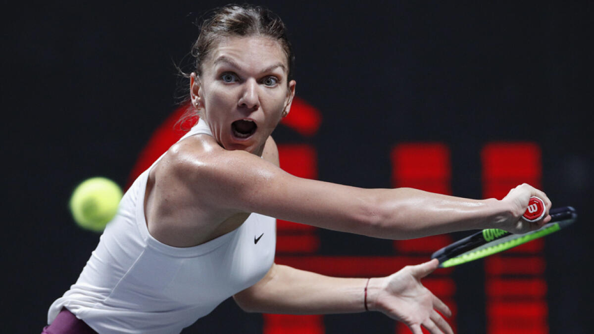 WTA Finals: Halep mounts raging comeback win over Andreescu