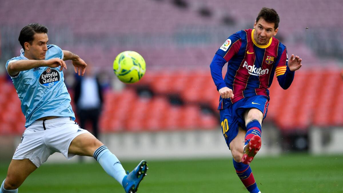 Barcelona's Lionel Messi shoots the ball during the La Liga match against Celta de Vigo. (AFP)