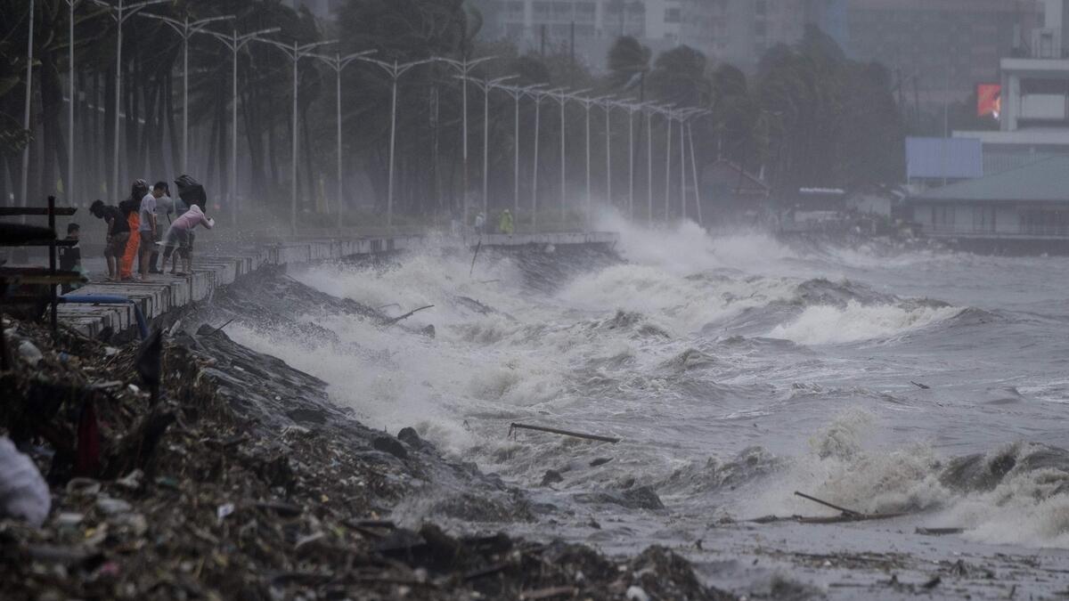 Typhoon kills 12 in Philippines, heads to China