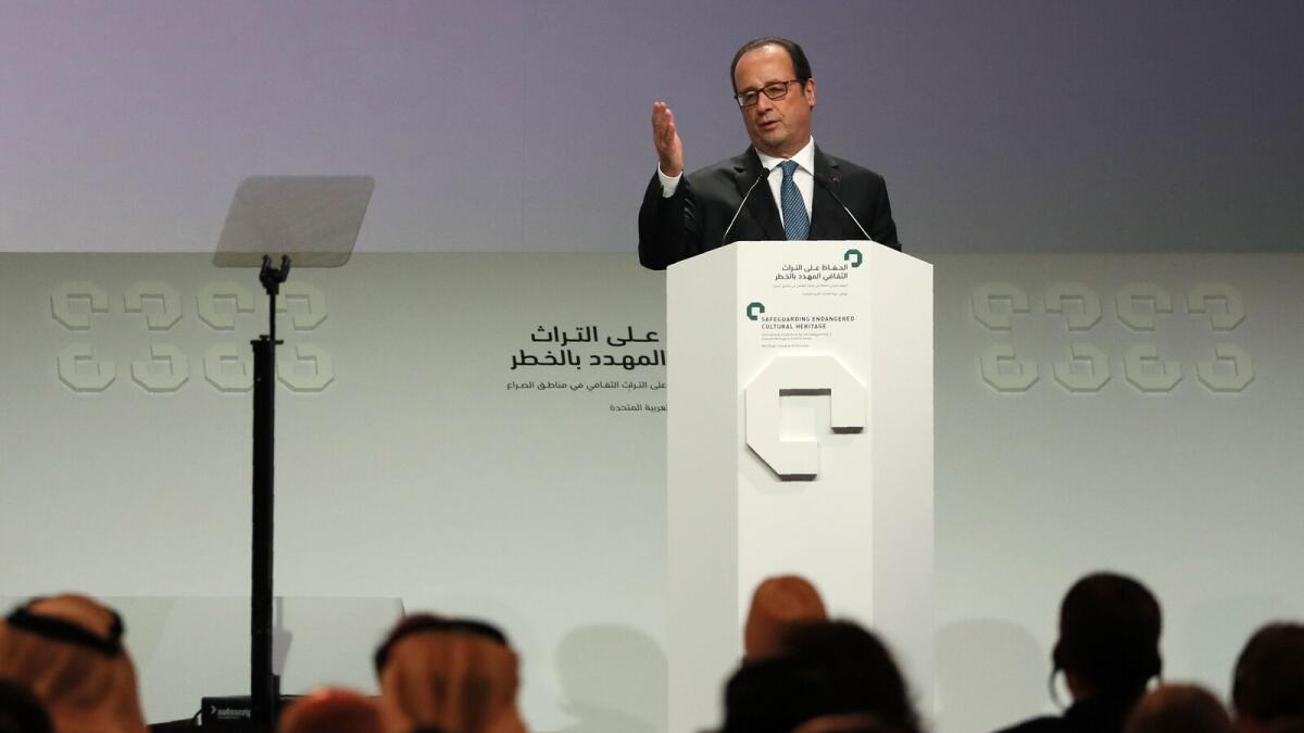 French President Francois Hollande delivers a speech during the closing ceremony of an international conference on protecting the worlds cultural heritage.