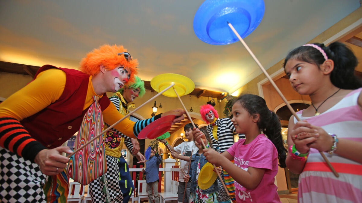Kids enjoying a circus workshop at the Mercato Mall in Dubai.-Photo by Dhes Handumon/Khaleej Times