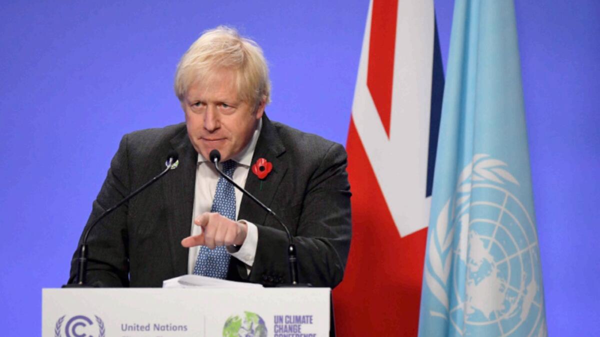Britain's Prime Minister Boris Johnson speaks during a press conference at the COP26 UN Climate Change Conference. — AFP