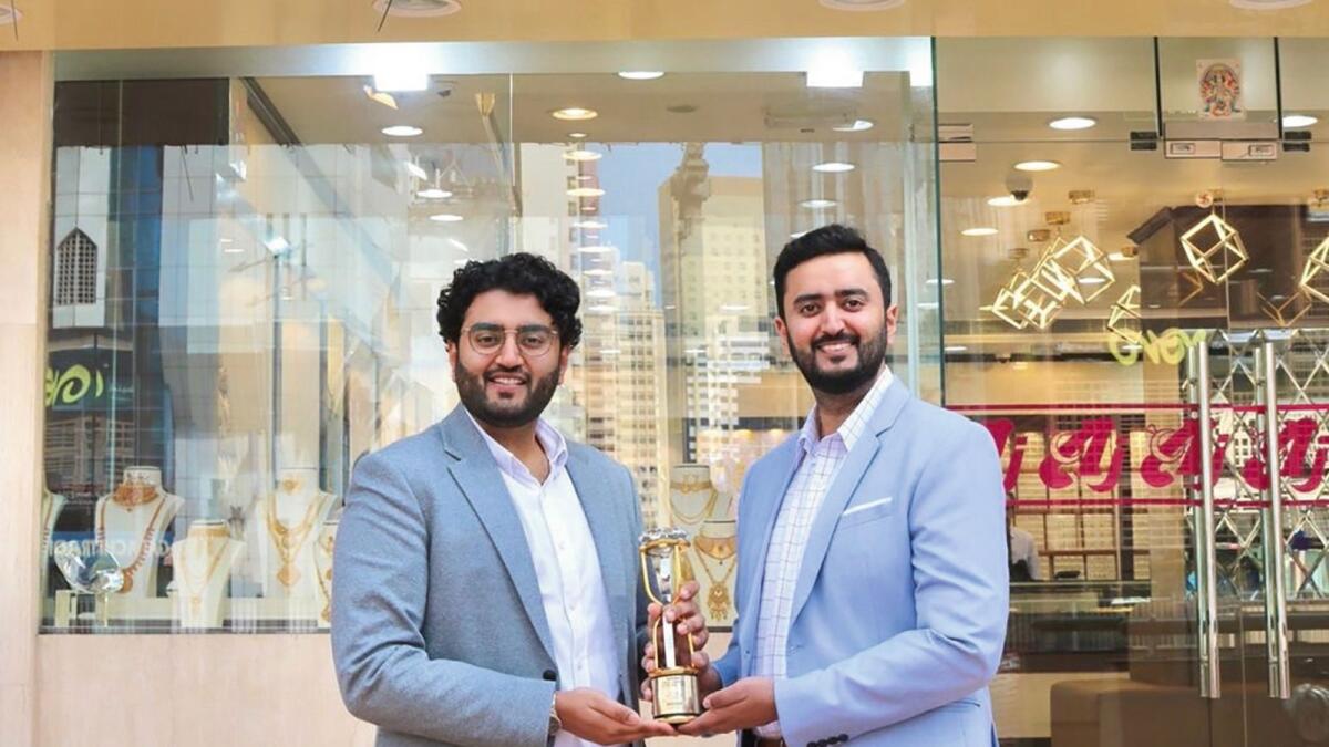 Anirudh and Varun Patni with the 'Best Value Jewellery of the Year in UAE' Award.