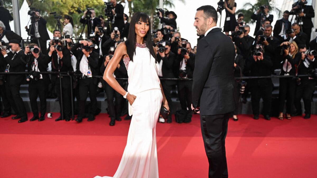 British model Naomi Campbell and Saudi Arabian film producer Mohammed Al Turki arrive for the screening of the film 'Firebrand' during the 76th edition of the Cannes Film Festival in Cannes, southern France, on May 21, 2023. — AFP