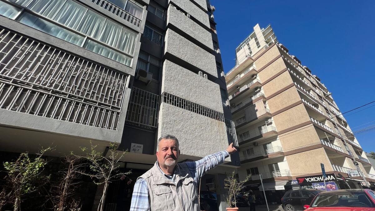 Lebanese writer Ziad Kaj, whose latest book released in January 2023 has a small chapter about the Israeli raid in 1973, points to one of the buildings where three top officials with the Palestine Liberation Organisation were killed by Israeli forces on April 10, 1973, in Beirut, Lebanon, Tuesday, April 4, 2023. — AP
