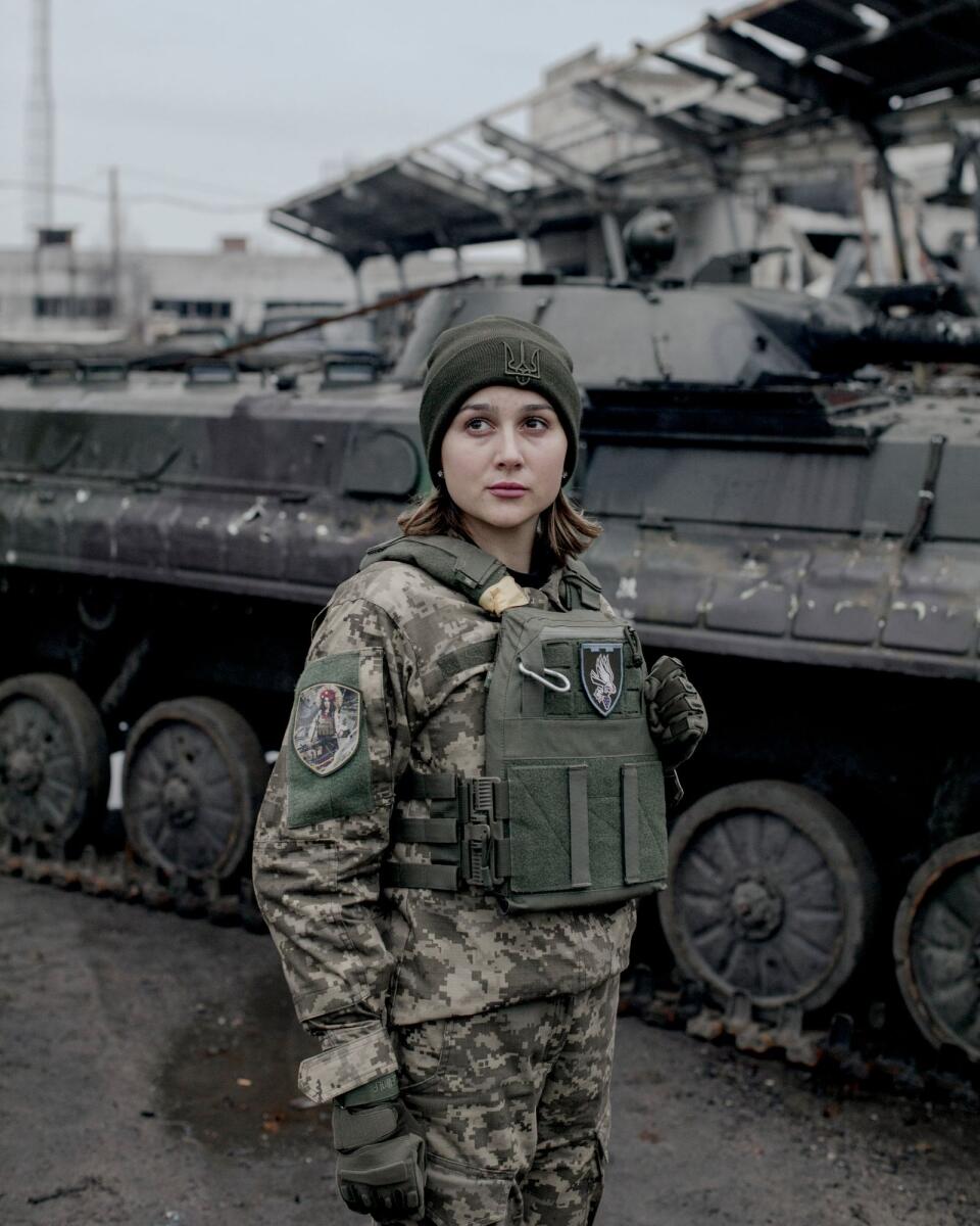 Anastasia Blyshchyk, a former television journalist who joined the military after her boyfriend was killed in combat, in Izium, Ukraine on Nov. 4, 2022. Blyshchyk said she was initially rebuffed when she volunteered to fight. “I heard, ‘You’re a woman, you need to make babies, go home.’” (Emile Ducke/The New York Times)