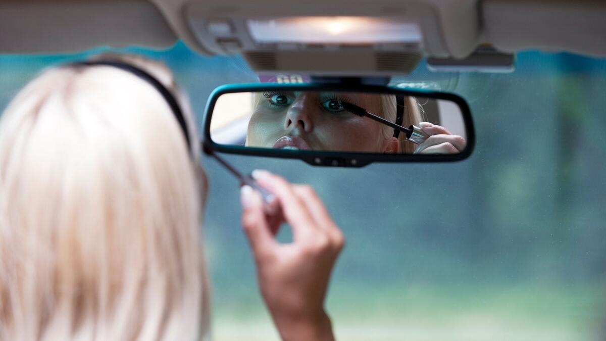 Dh365 fine for applying make-up while driving in Ireland