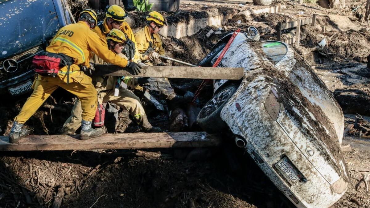 Photos: Death toll from California mudslides rises to 18 