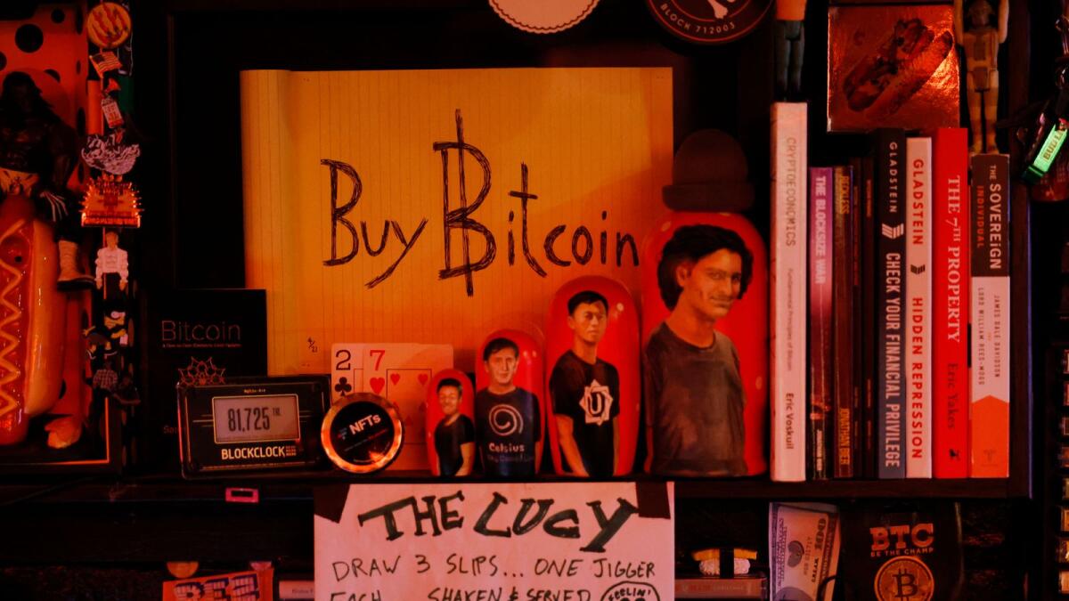 Bitcoin memorabilia are seen at a restaurant in New York. — AFP