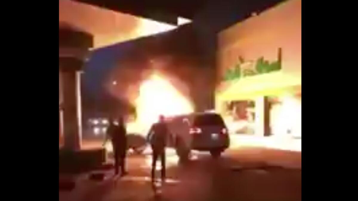 Video: Man risks own life, pushes burning car out of petrol pump