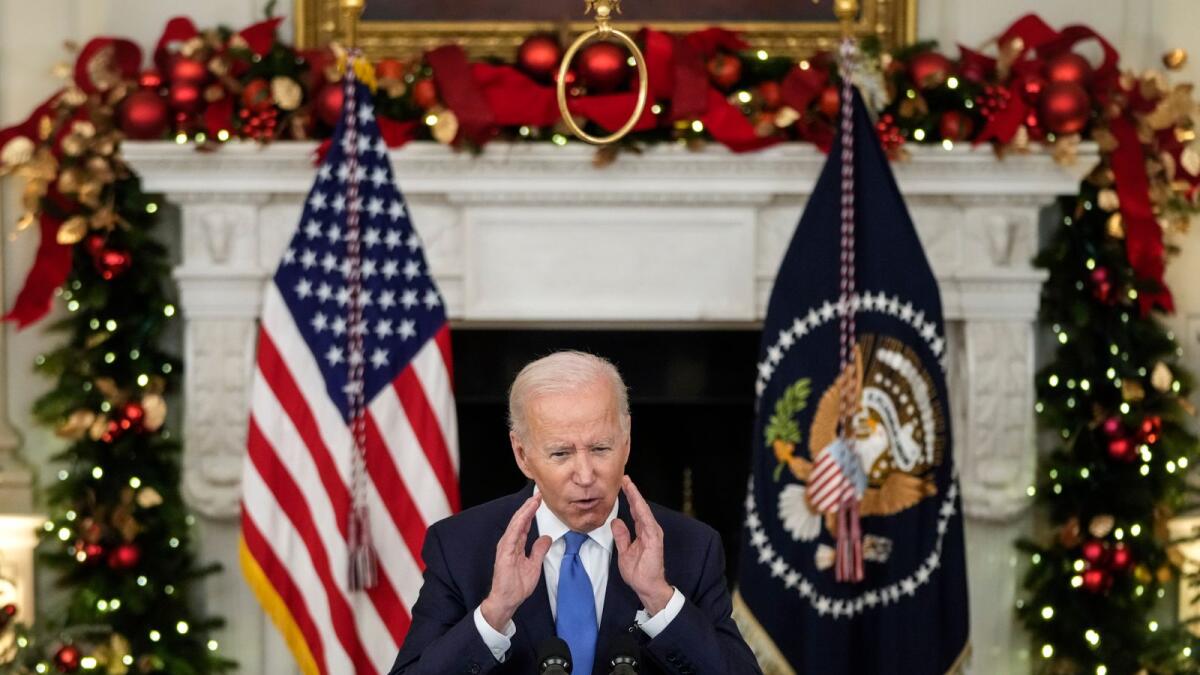 U.S. President Joe Biden speaks about the Omicron variant of the coronavirus in the State Dining Room of the White House, December 21, 2021 in Washington, DC. Photo: AFP