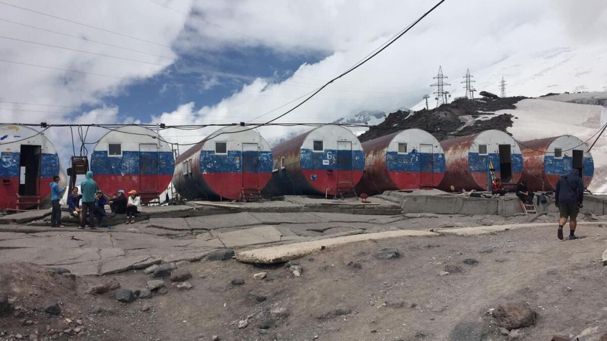 Metal barrels instead of tents on the mountain slope