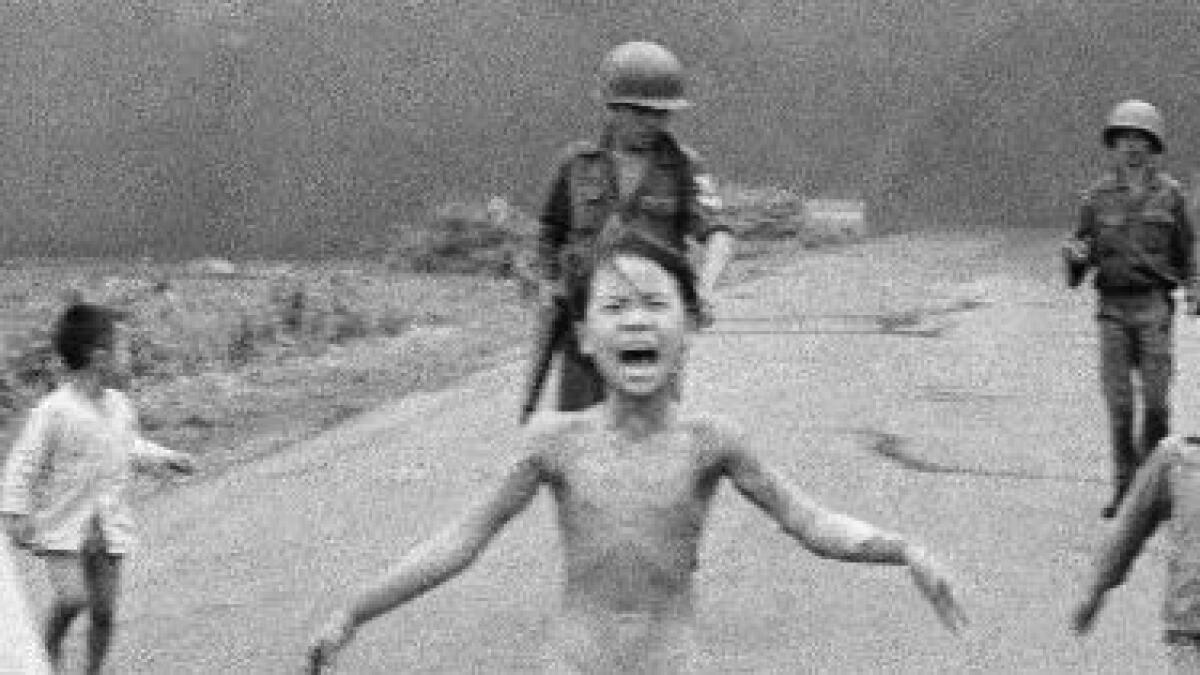 - This is a  June 8, 1972 file photo of South Vietnamese forces follow after terrified children, including 9-year-old Kim Phuc, center, as they run down Route 1 near Trang Bang after an aerial napalm attack on suspected Viet Cong hiding places . 