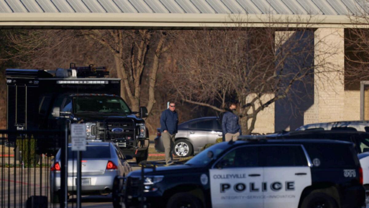 A Police car seen in front of the Congregation Beth Israel Synagogue in Colleyville, Texas during the hostage incident. — AFP