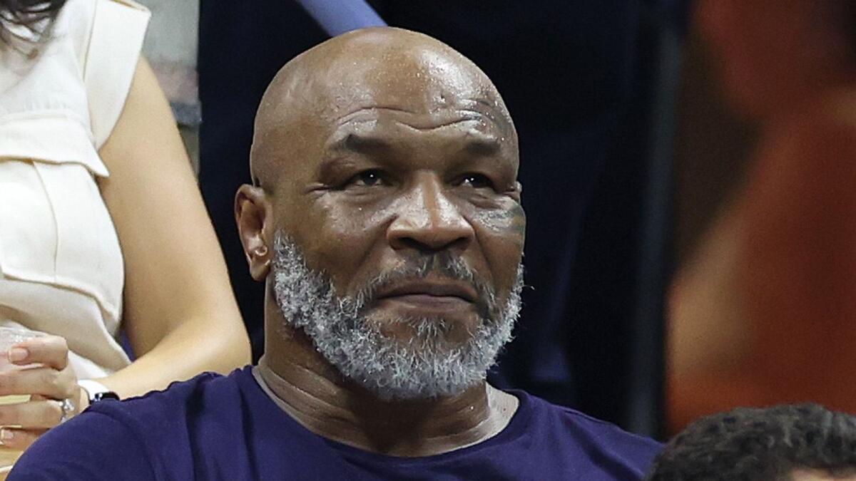 Mike Tyson looks on during the Women's Singles First Round match between Serena Williams of the United States and Danka Kovinic of Montenegro on August 29, 2022 in the Flushing neighbourhood of the Queens borough of New York City.   — AFP file