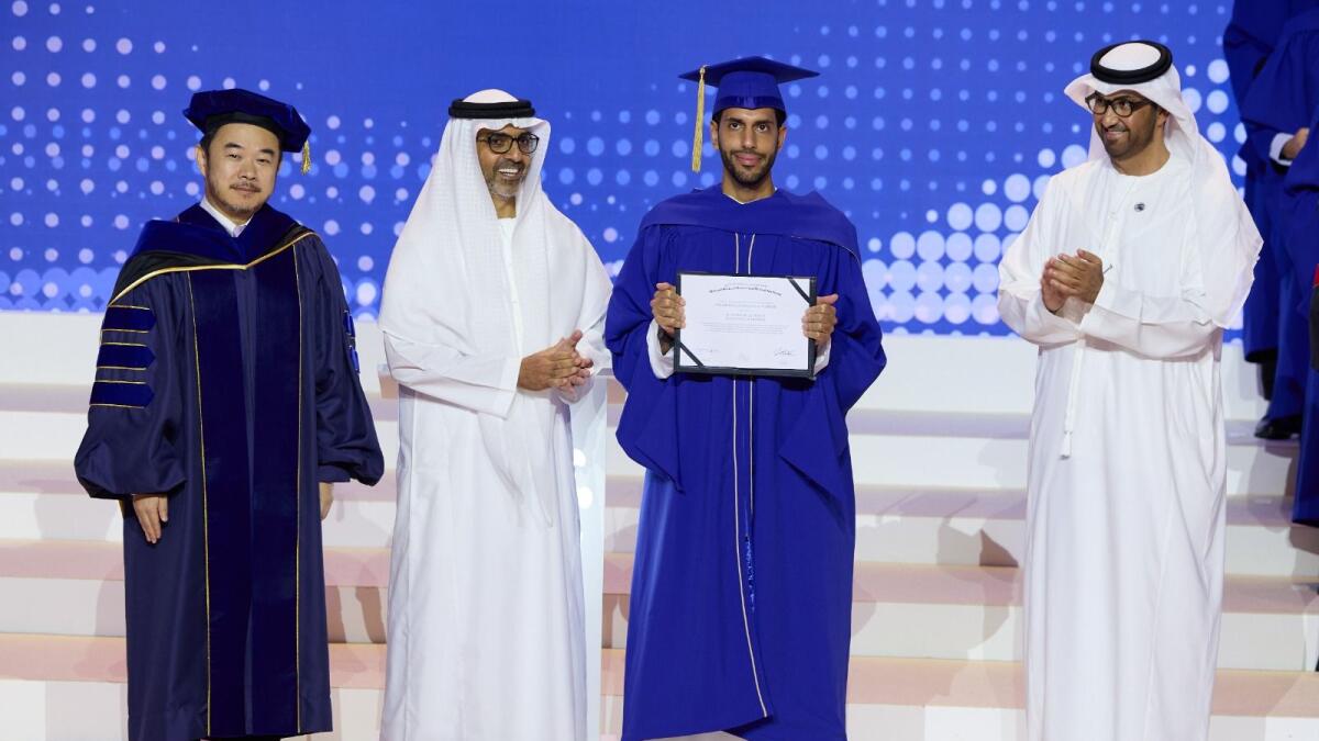 Sheikh Hamed bin Zayed Al Nahyan, Dr Sultan bin Ahmed Al Jaber and Eric Xing with a student at the MBZUAI graduation ceremony. — supplied photo