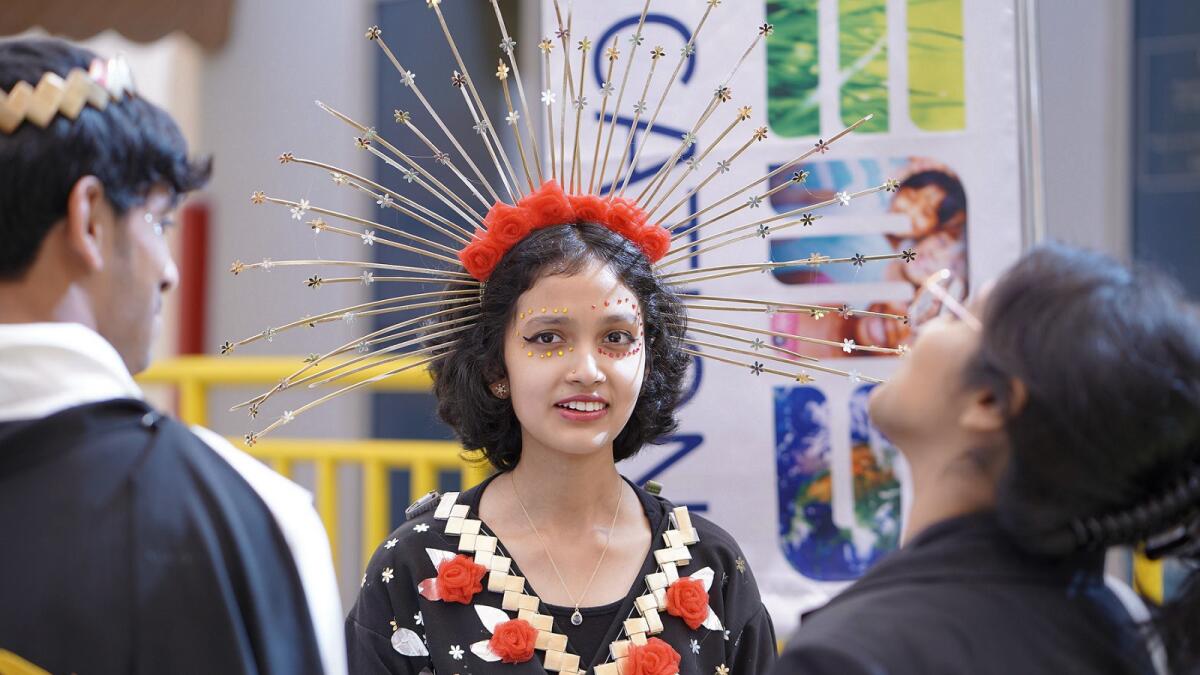 Students take part in a sustainable fashion show organized as part of Scope 2022. — Photo provided