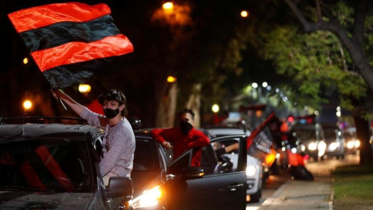 Newell's Old Boys fans hit the streets in Rosario, Messi's hometown in Argentina. They hope Messi will return to Argentina to play for his boyhood club after his decision to quit Barcelona. (Reuters)