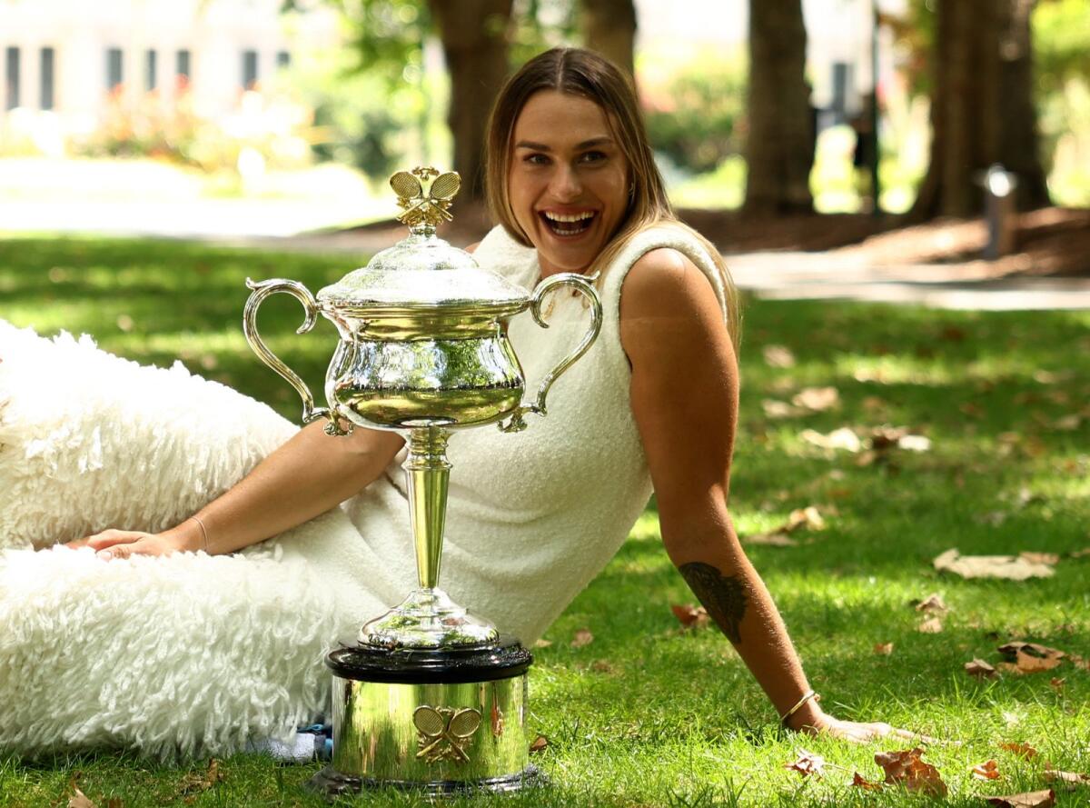 Aryna Sabalenka poses with the Australian Open trophy. — Reuters