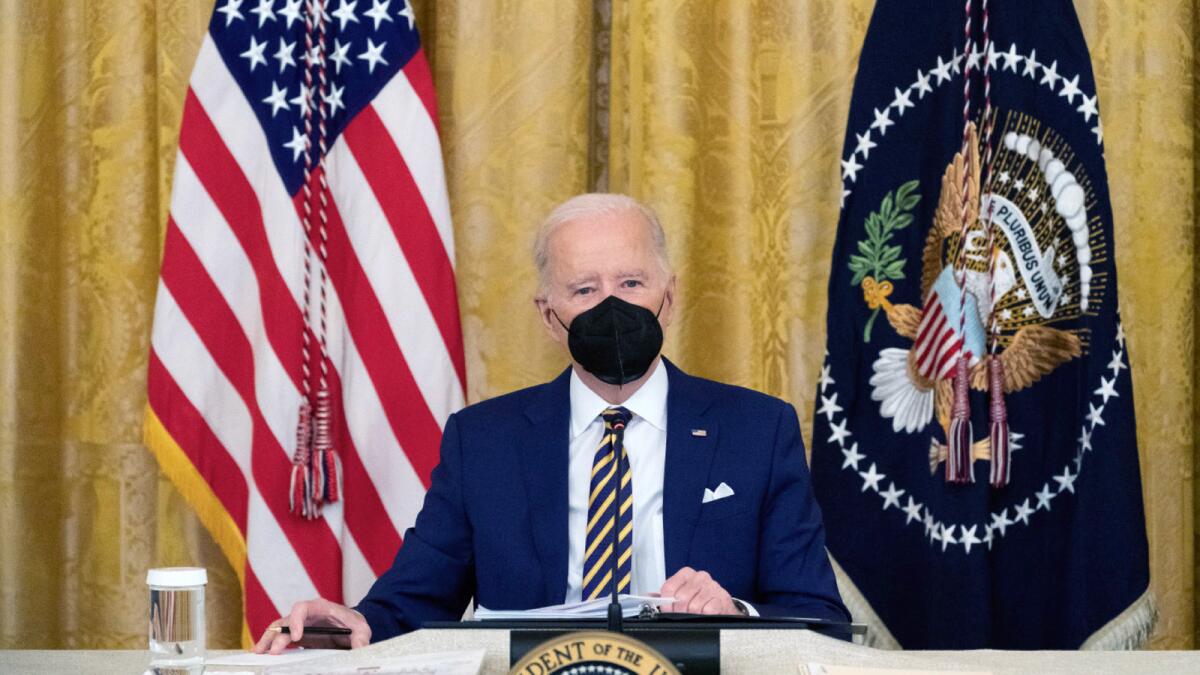 Joe Biden listens during a meeting with the National Governors Association in the East Room of the White House. — AP