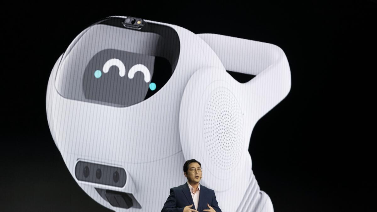 Henry Kim, team leader, ThinQ Platform Business at LG Electronics, announces the company's new smart home AI robot during an LG news conference in Las Vegas. — AP