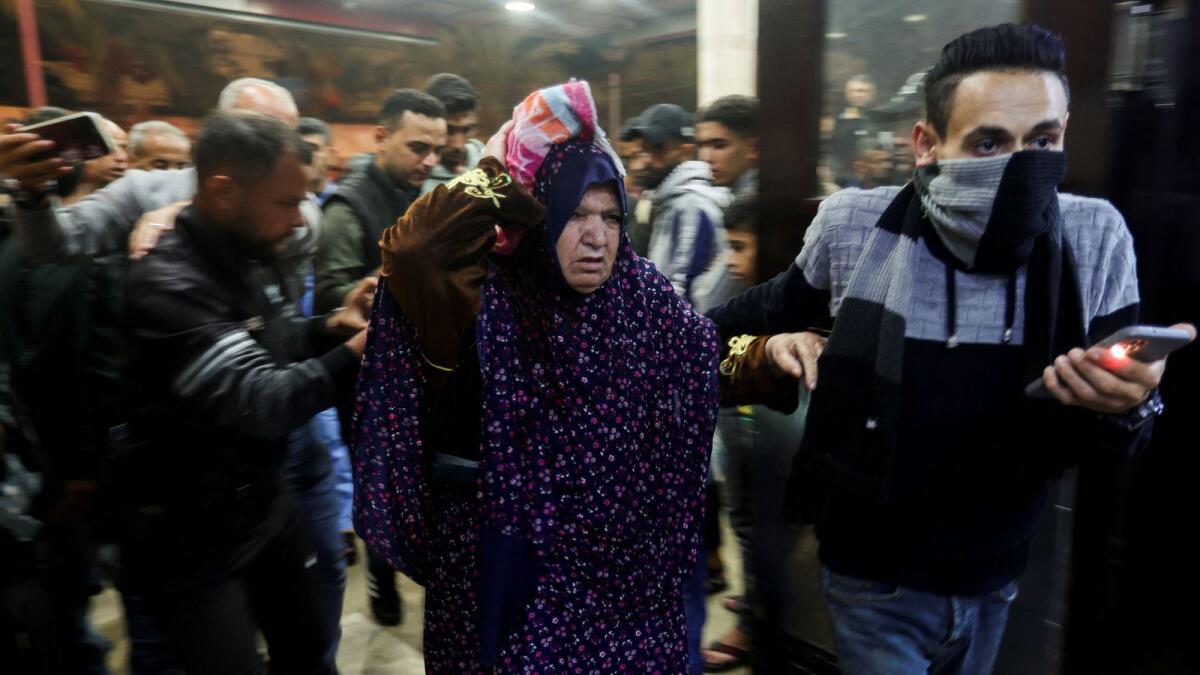 A Palestinian woman is rushed into hospital following an Israeli strike at Nasser hospital in Khan Younis. - Reuters