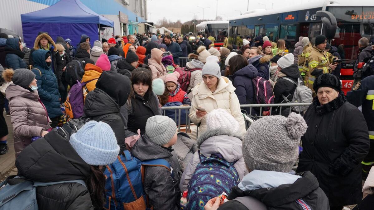 Refugees from Ukraine gather at the distribution centre in Korczowa, Poland, on March 4, 2022. Photo: AFP