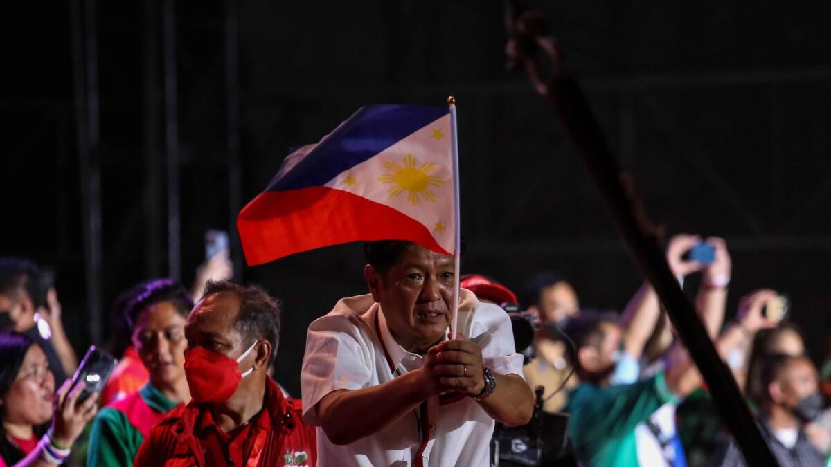 Philippines presidential candidate Ferdinand Marcos Jr greets his supporters during the last day of campaign rally at Paranaque City, suburban Manila on May 7, 2022. Photo: AFP