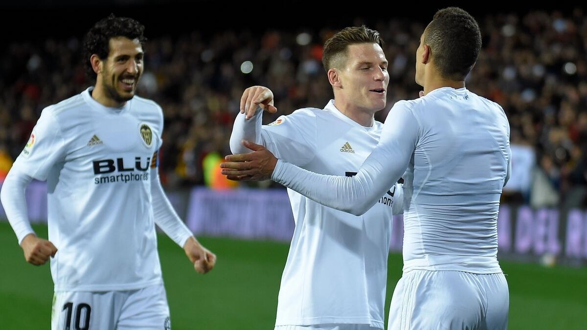 Valencia reaches Copa semifinal with 2 stoppage-time goals