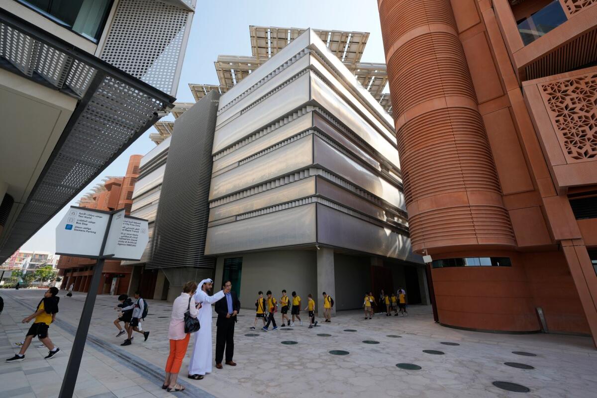 People visit Masdar City near Abu Dhabi, United Arab Emirates, as Dubai hosts the COP28 UN Climate Summit. — AP