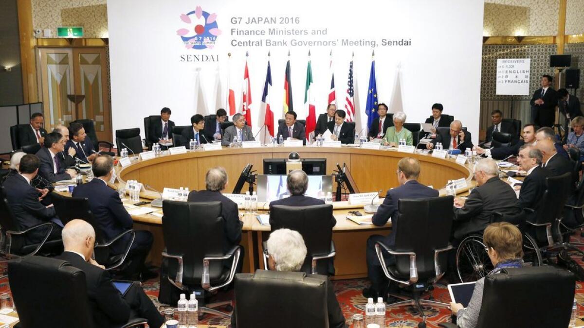 Japanese Finance Minister Taro Aso presides over a meeting of finance ministers and heads of central banks of the Group of Seven in in Sendai. 