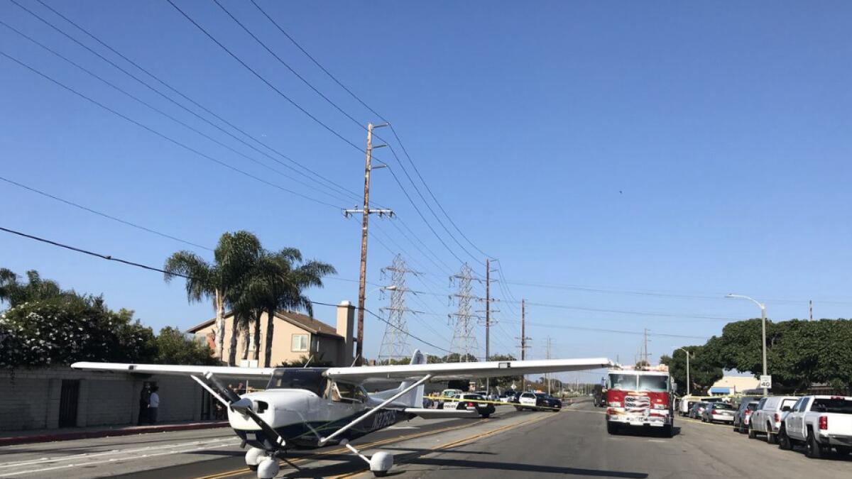 Caught on camera: Plane lands on a busy road in California