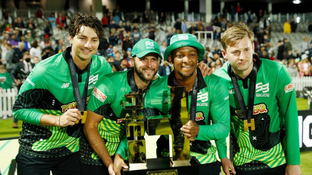 Southern Brave players celebrate with the trophy after winning The Hundred final against  Birmingham Phoenix. — Reuters