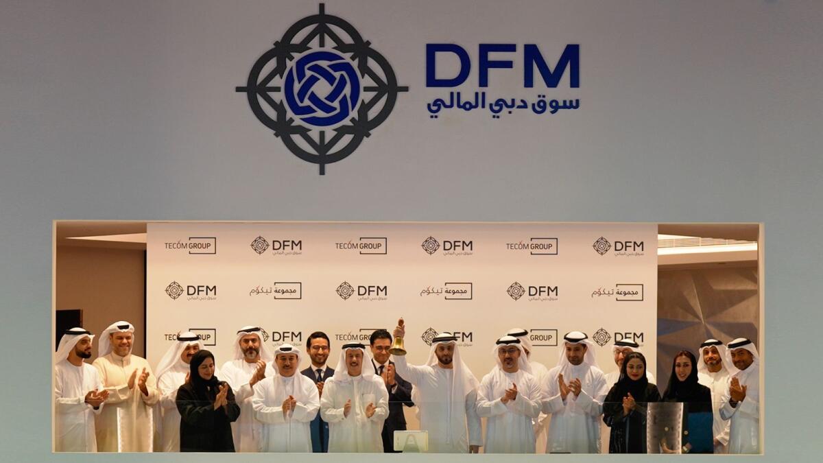 Malek Al Malek rings the market opening bell at official listing ceremony of Tecom Group in the presence of Amit Kaushal, Abdulla Belhoul and Hamed Ali along with  several other officials.