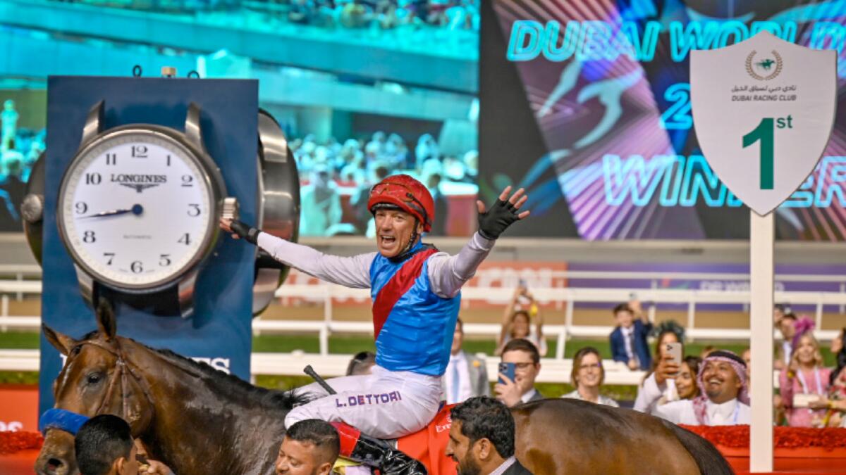 Frankie Dettori celebrates after riding Country Grammer to Dubai World Cup victory at the Meydan racecourse on Saturday. (Photos by M. Sajjad)